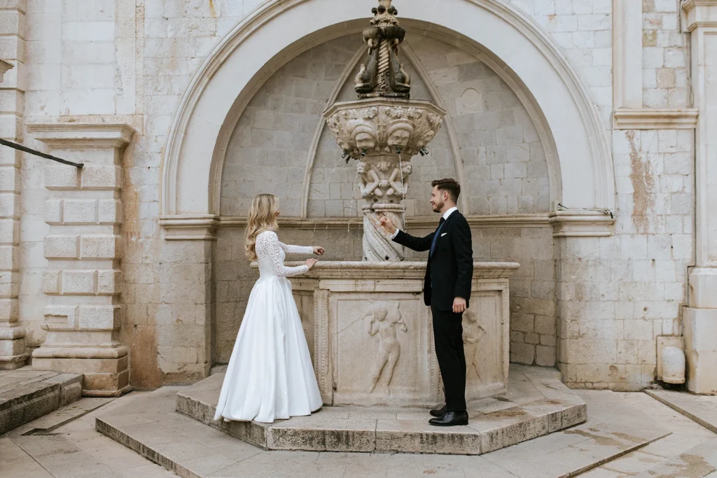 married couple at the water fontain