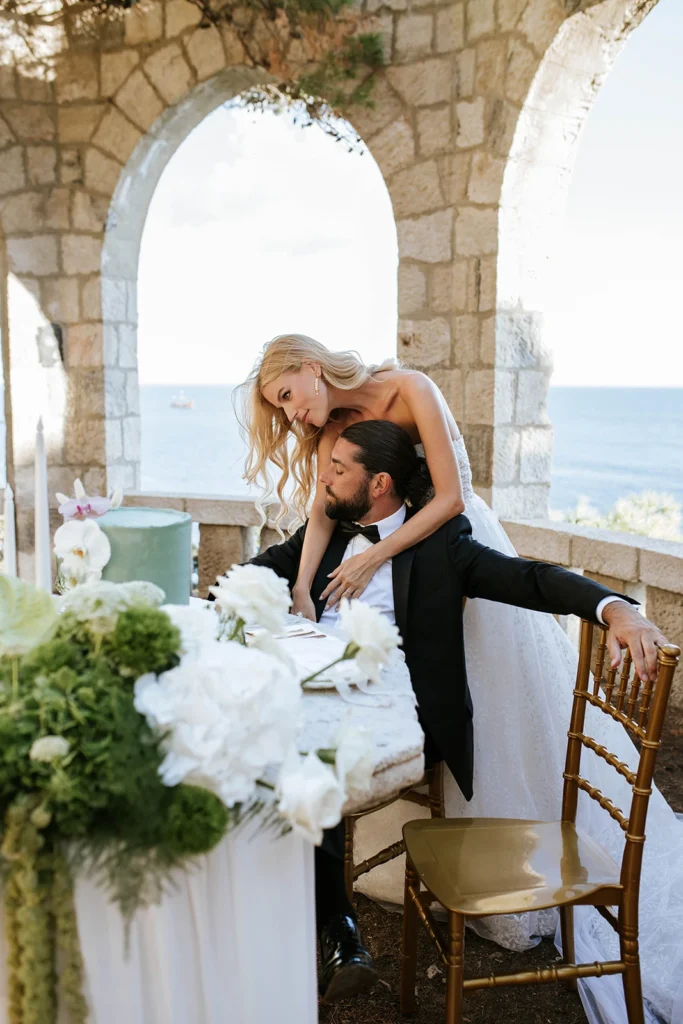 girlfriend hugging her husband, just married
